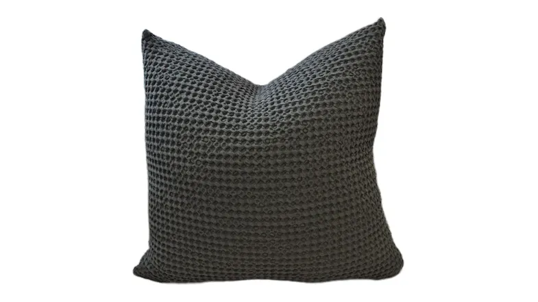 Soft gunmetal-coloured cushion with a feather-filled interior, featuring a textured surface and waffle-like pattern Soft gunmetal-coloured cushion with a feather-filled interior, featuring a textured surface and waffle-like pattern